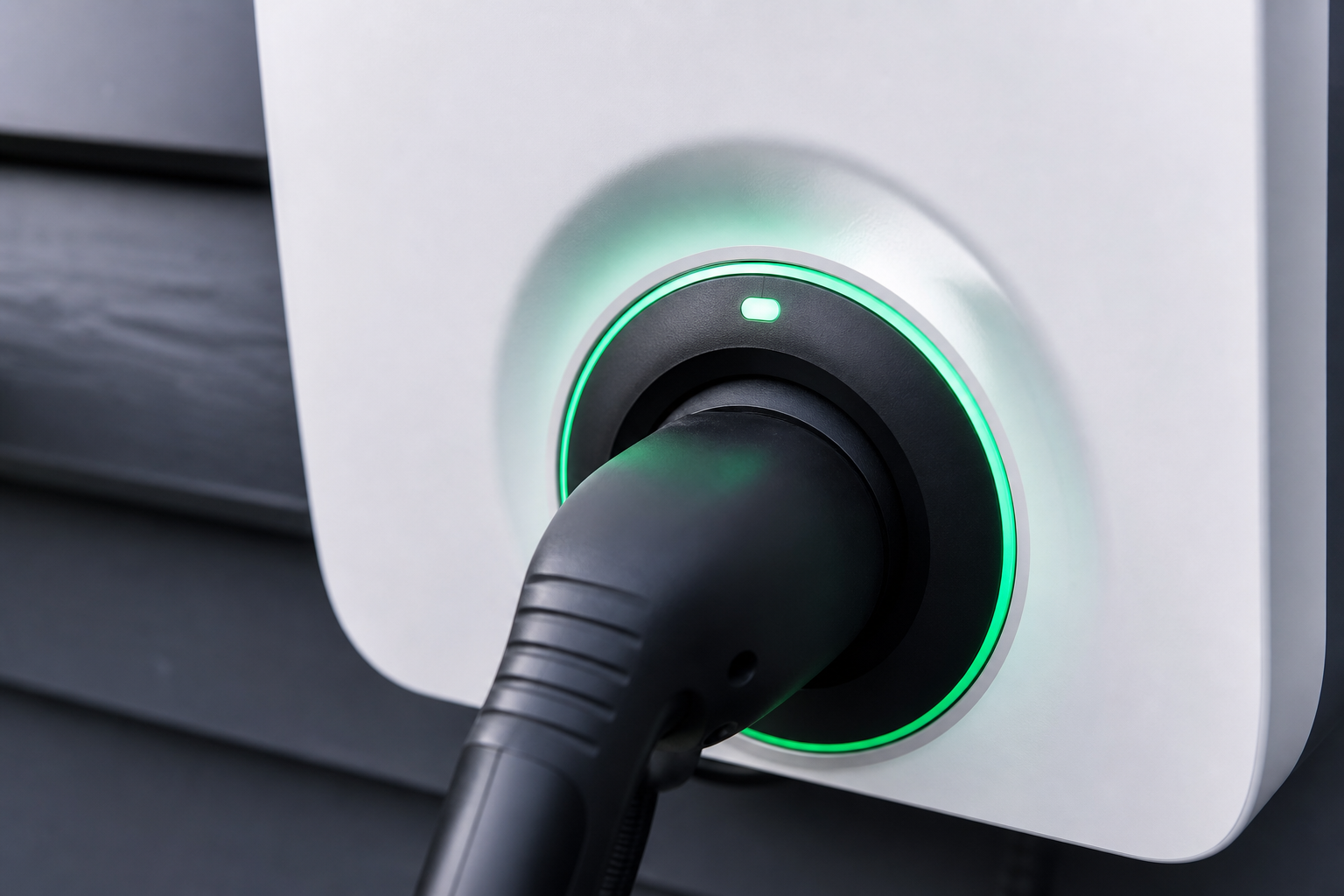 Close detail of smart EV charger app display and charging status LED