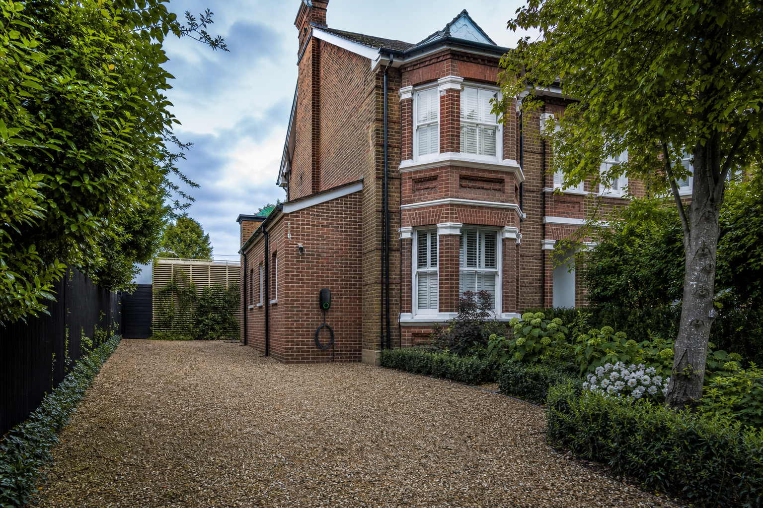 Wide view of the EV charging point on a St Albans residential driveway